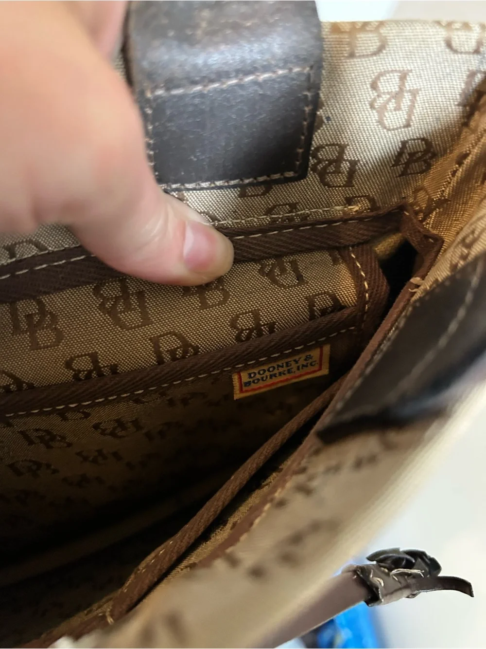 Dooney & Bourke Beige Monogram Drawstring Shoulder Bag with Dark Brown Trim